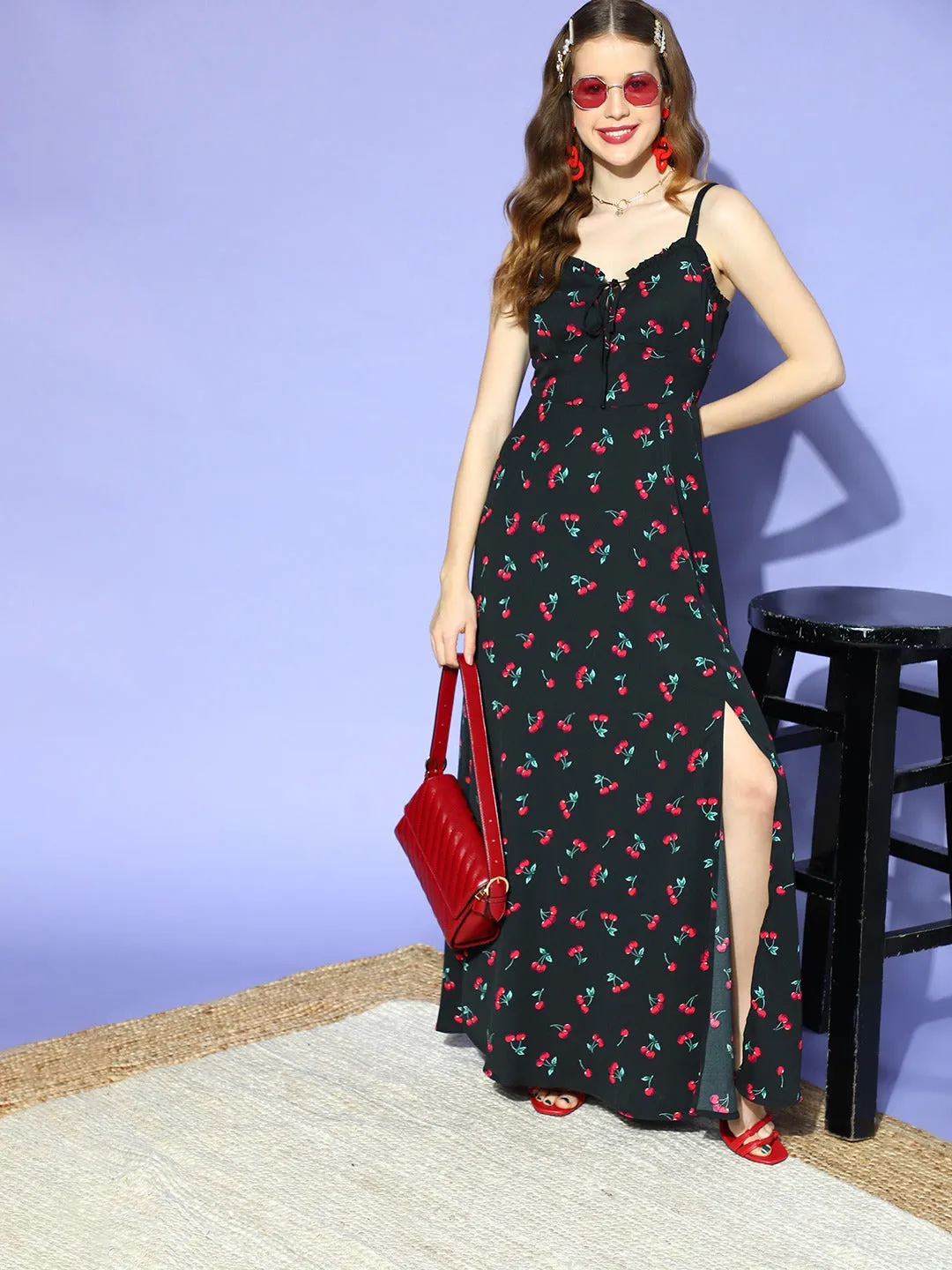 Berrylush Women Black & Red Cherry Printed Sweetheart Neck Front Tie-Up High-Slit Flared Maxi Dress